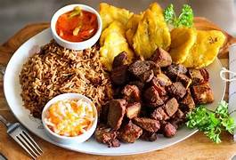 Haitian cuisine — griyo, diri, bannann